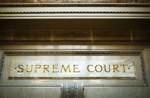Supreme Court Sign above Doorway