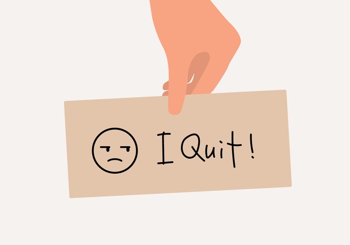 Sign with frown says I quit